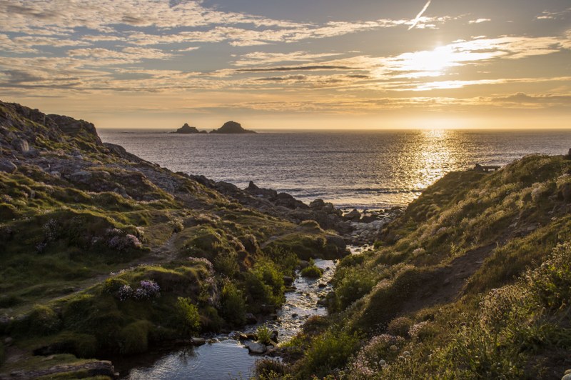 Porth Nanven, a stunning hidden calley and cove near Cape Cornwall, with the Brisons in the background