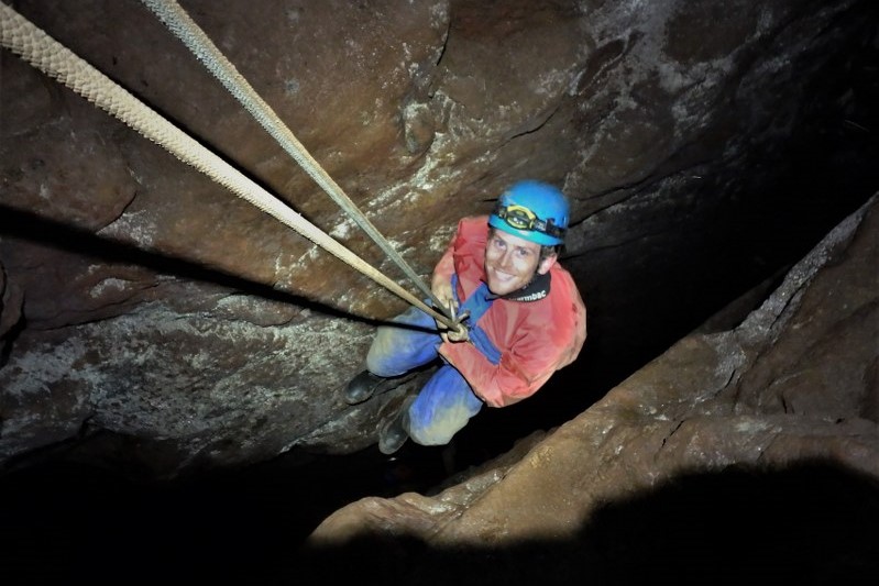 Abseiling down a mine shaft in Wheal Hermon, St. Just Cornwall