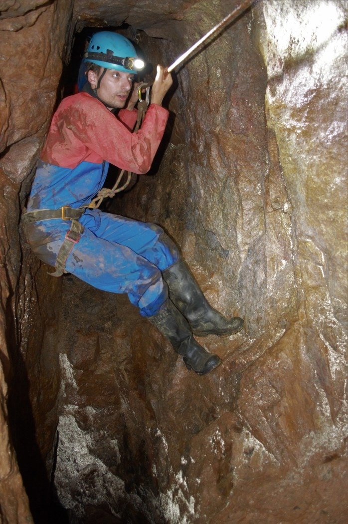 Mine explorer having fun in a tin mine in Truro, Cornwall