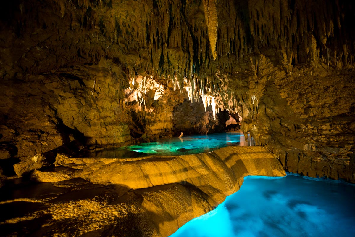 A jaw-droppingly beautiful cave with deep blue pools of water