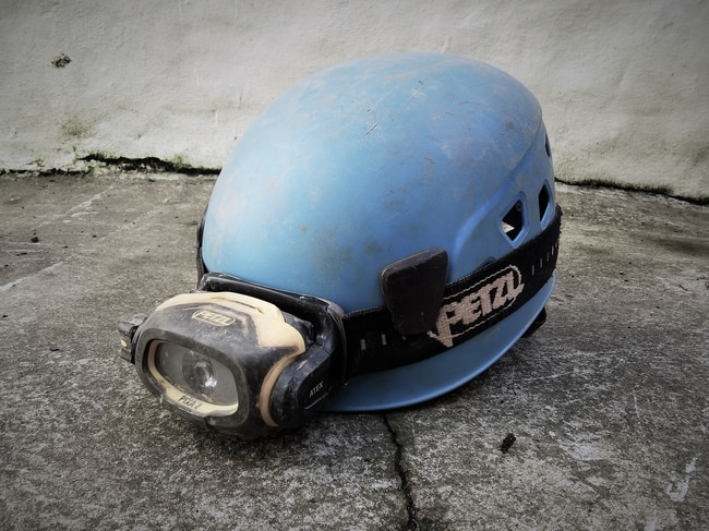 Helmet and head torch combo used for mine exploration in Cornwall