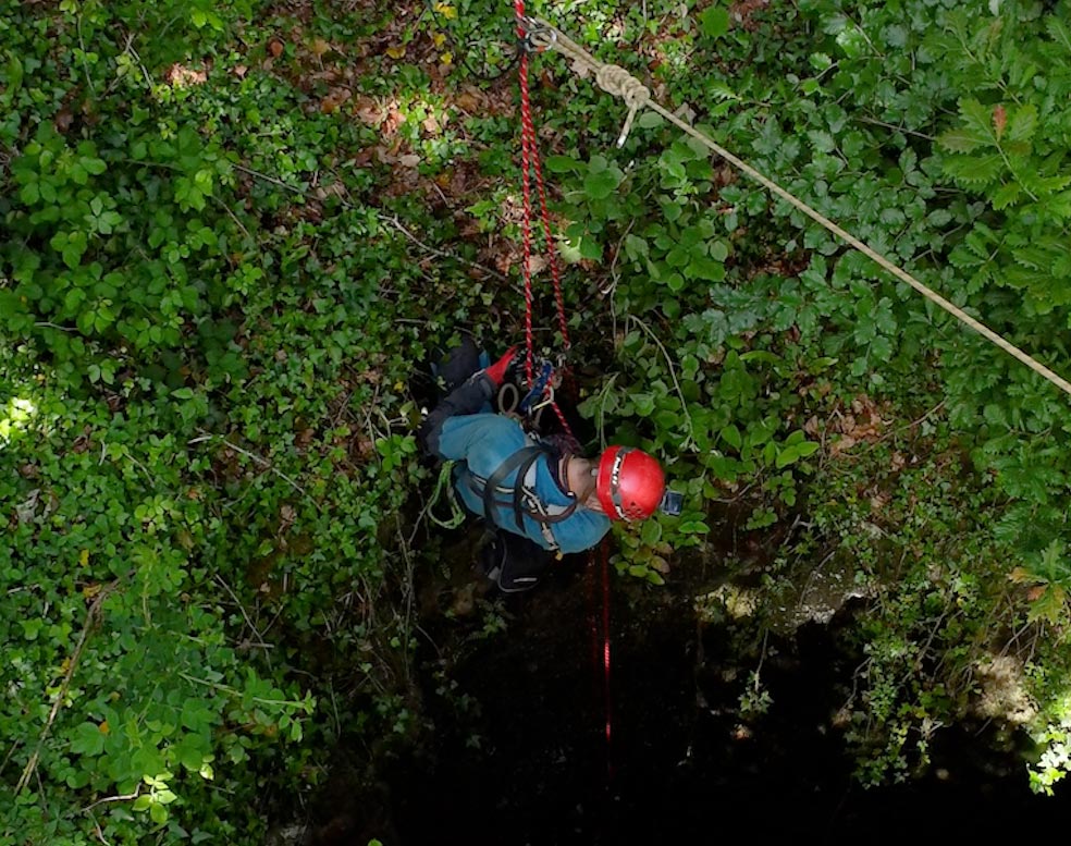 Mine Explorer abseiling down a mineshaft in southeast Cornwall. Photo by Cornwall Underground Adventures