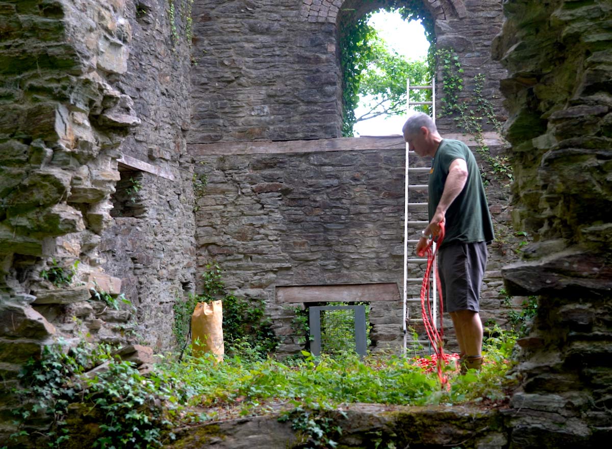 Rope Access Technician Rigs Ropes for Exploring a Mineshaft in southeast Cornwall.