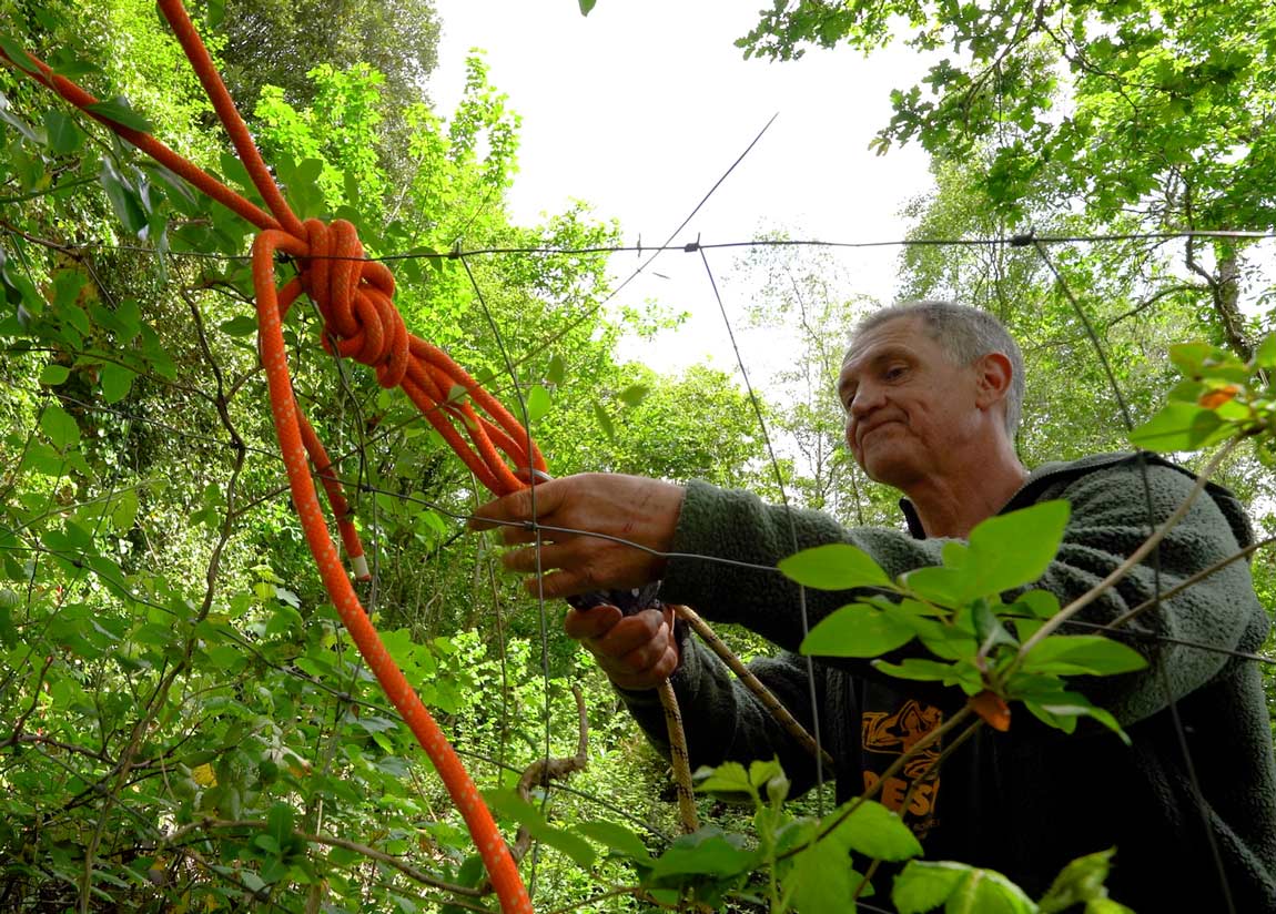 Rope Technician rigging an adjustable deviation to explore a mineshaft in Cornwall