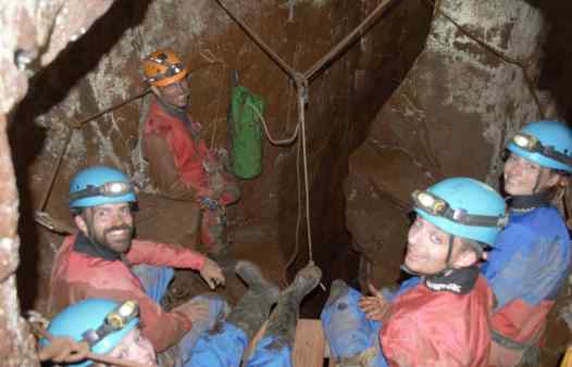 Mine explorers gathering for a break in a 'room' in a Cornish tin mine.