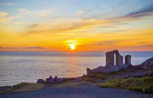 Sun sets  on the mine ruins at Botallack, St. Just Cornwall. Cornwall's best site for exploring the surface mine features.